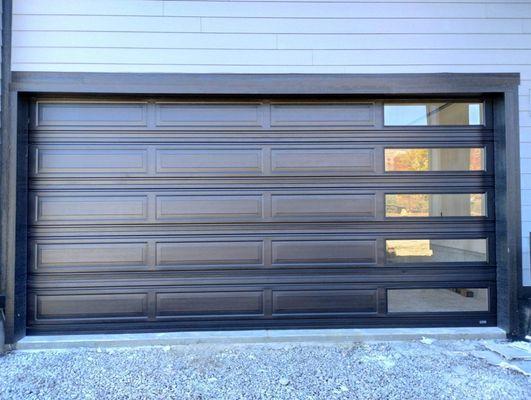 New garage door instillation to replace a dented door