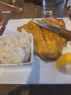 Herb crusted trout with garlic mashes potatoes