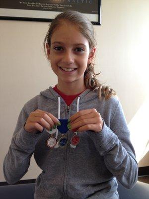 Another athlete with medals. Congratulations!