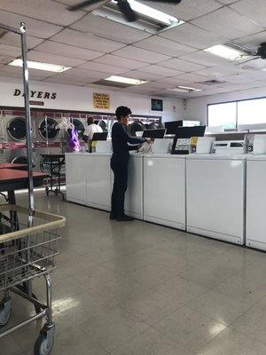 She scrubbed with soap and water before drying each machine.