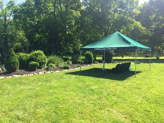 This peaceful graveside setup is included with all of our grave openings.