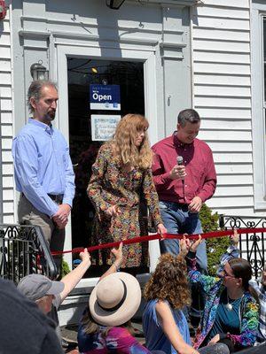 Ribbon cutting at Spring Stroll with artists and mayor