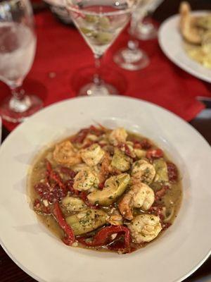 Shrimp pasta with artichoke, sun dried tomato and mushrooms