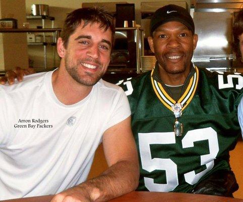 Packers QB Rodgers and Mike Maddog Douglass Packer Hall of Fame Linebacker.