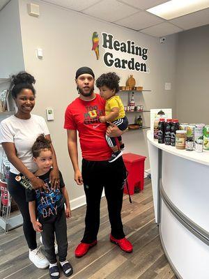 a young Atlanta family making sure they are on top of their health with Healing In The Garden supplements and herbal products.