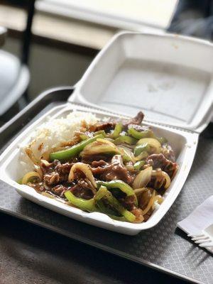 Pepper steak over rice