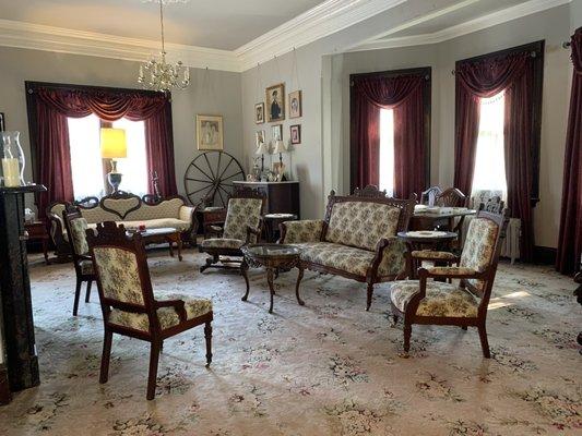 Main parlor room with original 19th century furniture