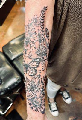 Lower arm half sleeve.. flowers and butterflies. By tattoo artist Jay Boss.