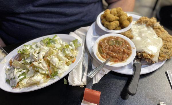 Side salad, chicken fried steak, pinto beans, fried okra