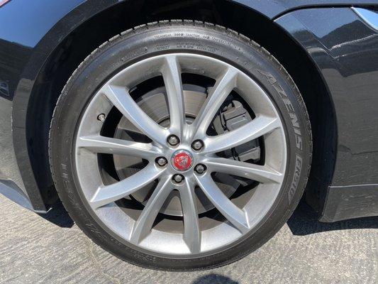 Wheels and caliper before on a Jaguar F-Type