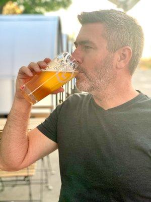 Brett enjoying a sunset pint