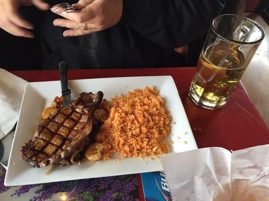 Ribeye and shrimp with a beer