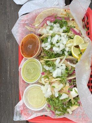 Tacos with side sauces