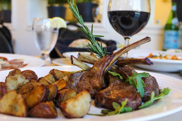 lamb chop served with roasted potatoes