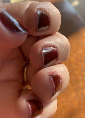 Coverage missing along nail tips and under, standard practice to keep polish from creeping off.