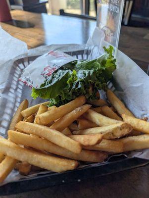 Peanut butter pickled bacon on lettuce wrap