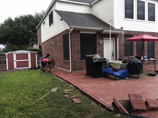 Patio extension and new walk way on left and right side