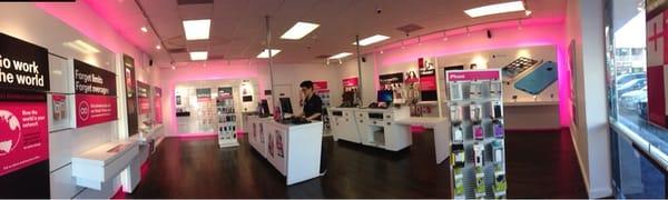 Inside the store of T-Mobile. Clean atmosphere with friendly sales associate!