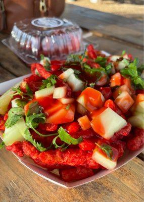 Crazy Cheetos (Hot Cheetos topped with Cucumber, Cilantro, and Chamoy)