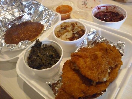 Fish dinner, greens, potatoes, cornbread, cobbler