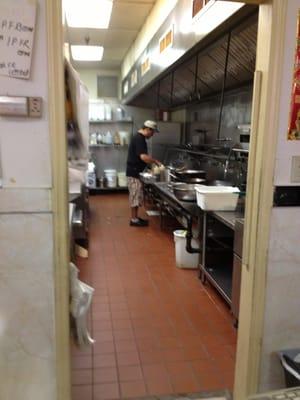 Kitchen is huge open door with nice gas fired woks