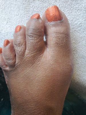 Poor paint job cuticles not cut toenails not shaped