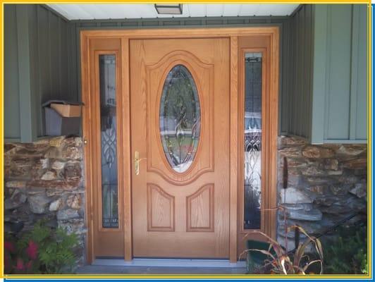 Natural Oak Pre-finished Fiberglass Entry Door with Decorative Glass and Enhanced Security Multi-Point Locking Hardware.