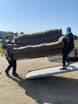 Here we are loading furniture into a box truck professionally with ease and being fast and safe