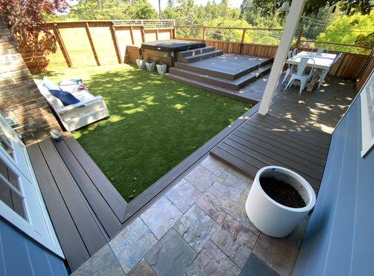 Multi-level deck with hot tub wrapped with "Azek" PVC in American Walnut