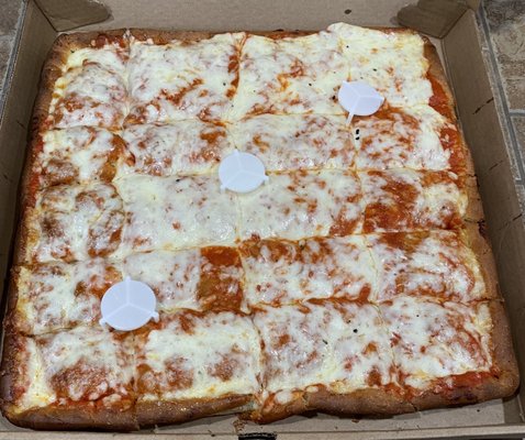 Sicilian Pizza - the dough is on the soft/lighter side and lacks some flavor, cheese and sauce are good