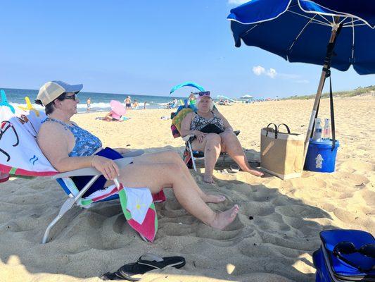 Relaxing at Nags Head with Farm Dog chairs and umbrellas!