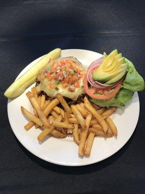 Black Bean Burger - House made patty of black beans, corn, roasted onion and poblano chili topped with monterey jack cheese, pico de gallo