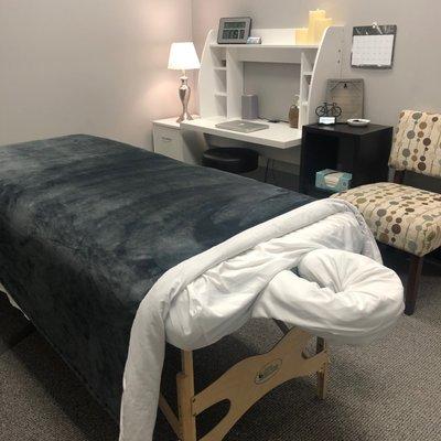 A view from inside of the massage room from the front of the table.