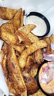 There are there seasoned potato wedges