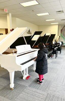 He has his eyes on this white limited edition John Lennon piano