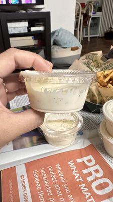 They are cutting back on their ranch! Ridiculous that we pay $1.50 per container and they can't even fill it up