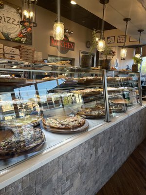 Front counter shelves of Italian food items.