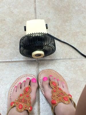 I have to dry my nails with this tiny fan!