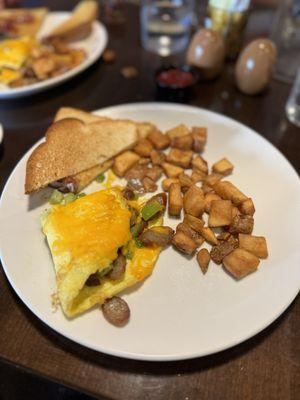 Got the omelette with sausage, peppers, and cheddar cheese. Included toast and potatoes for $18 after tax so about $21 after tip).