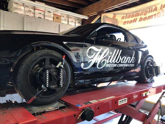 Lowered Mustang getting an Alignment Service