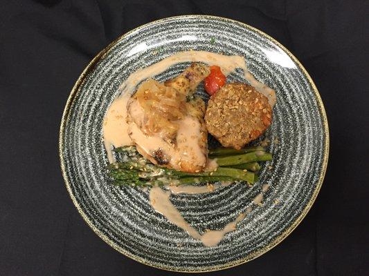 Guava Chicken with Sweet Potato Souffle, Grilled Asparagus, Flax Seed, and Caramelized Shallots.