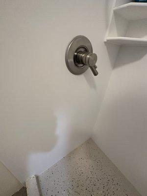 Shower install we chose white walls with a patterned shower pan