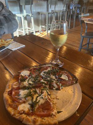 Margarita pizza (with pepperoni I requested)  and a delicious Chardonnay!