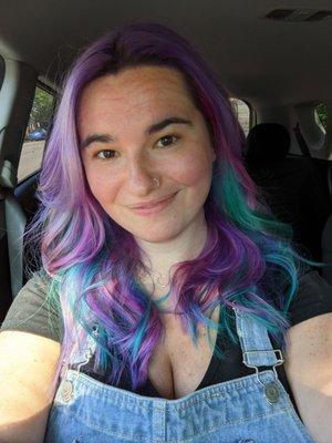 Top layer of purple with teal, pink, and purple underneath