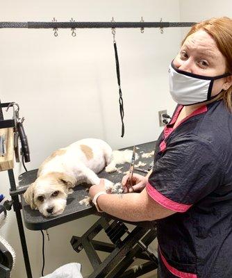 Our new Groomer Brittany with her VERY enthusiastic pup!