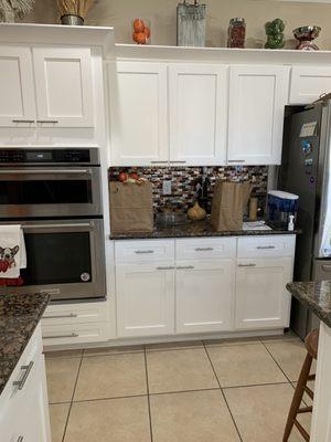 doors, drawers and cabinets completely refinished