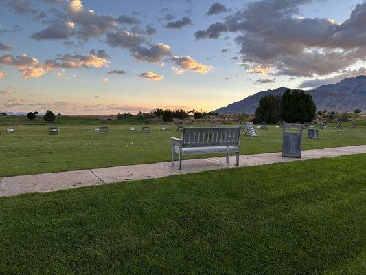 Driving range with complimentary pyramids of range balls