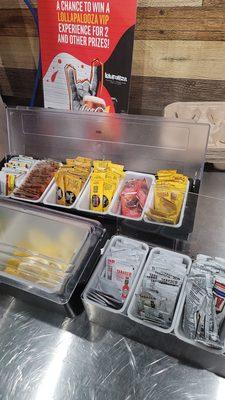 Organized sauce packets at beverage station