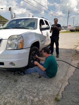 Finishing up with a customer's tire