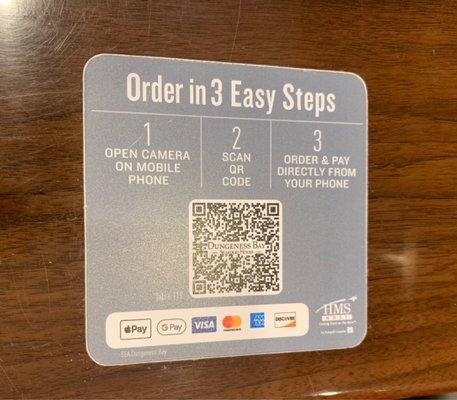 San QR code at table to order and pay.